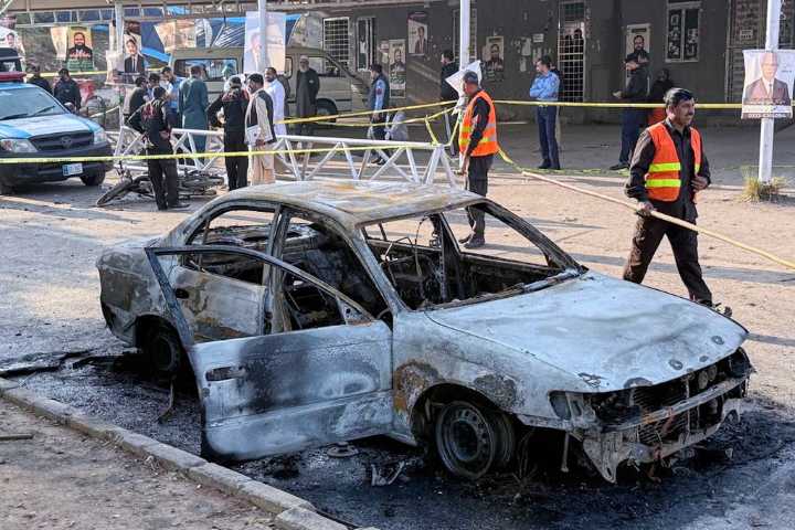 Suicide bomber kills 12 in Pakistan, wounding dozens more