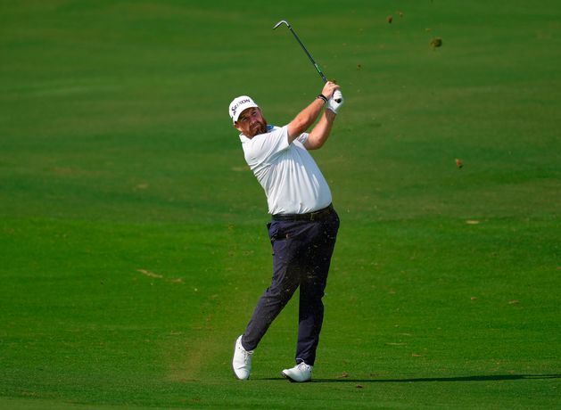 Wayward McIlroy hangs tough as flawless Lowry joins him in second place in Dubai