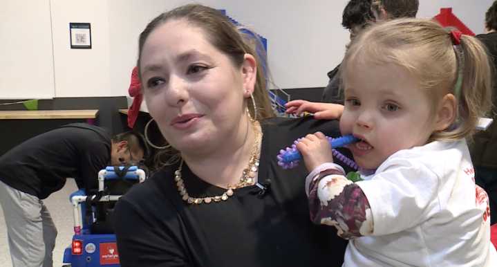 Nonprofit gifts modified ride on cars to children with mobility disabilities