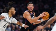 Booker scores 28 and Wembanyama has off night as Suns hand Spurs their first loss, 130