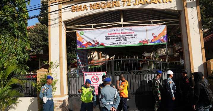 Multiple explosions shake a mosque in an Indonesian high school, injuring dozens