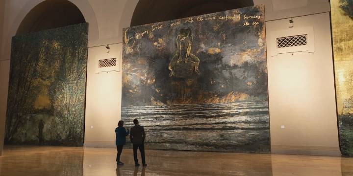 The paintings are bigger than a building, made just for St. Louis by one of the decorated artists on earth