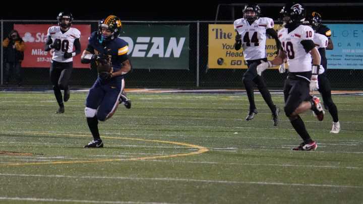 Photos: St. Johns-Haslett, DeWitt-Owosso - Week one football playoffs