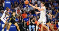 No. 10 Florida rolls Merrimack 80-45 as world's tallest teen scores first collegiate point