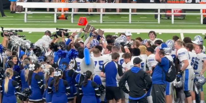 McQueen High football team claims state title