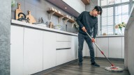 The Common Kitchen Essential You Should Start Adding To Your Mop Water