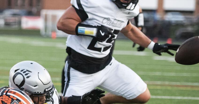 Three of a kind: Indistinguishable Oakdale linebackers Schmuck, Tehaan and Valley make same type of impact