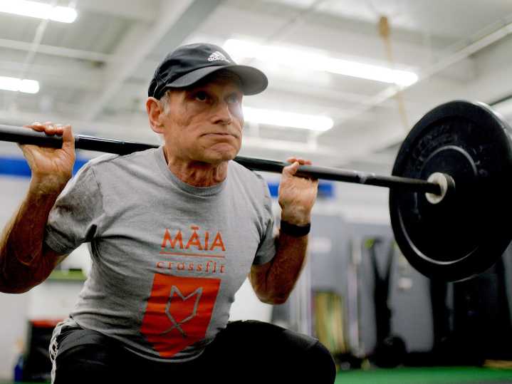 A 79-year-old competitive powerlifter shares his 5 tips for longevity and happiness — from enjoying chocolate and carbs to setting goals