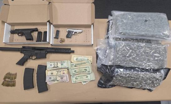 Traffic stop involving stolen vehicle leads to firearms cache