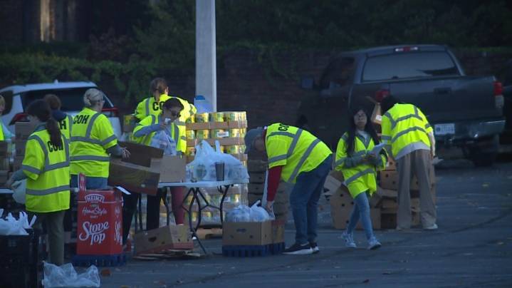 Church, students serve hundreds during food distribution event