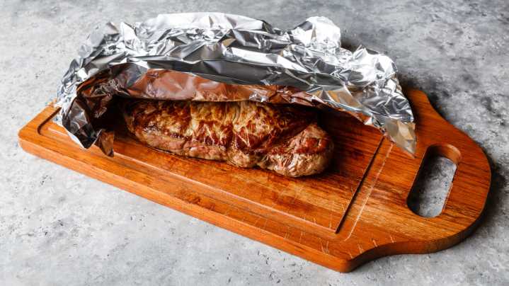The Aluminum Foil Mistake That's Ruining The Crust On Your Steak