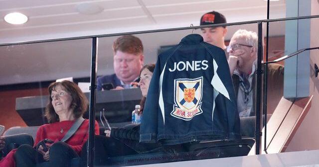 Jones's jacket hangs in suite as family members watch Canadian Curling Trials
