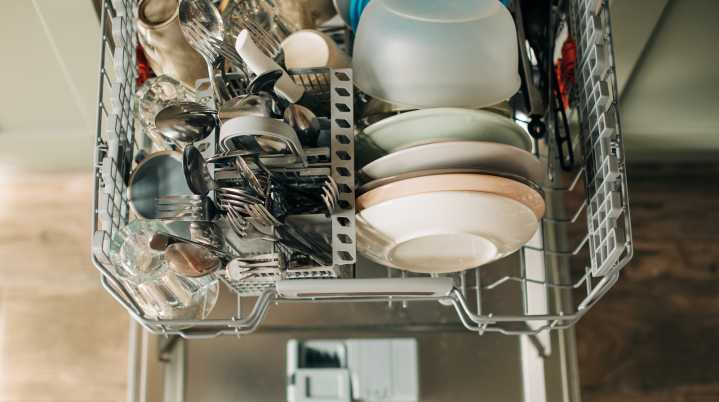 Why Your Dishes Smell Funky After Going Through The Dishwasher