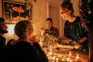 Miss Manners: If I hire my cleaning lady to help serve holiday meal, should she sit with family during dinner?