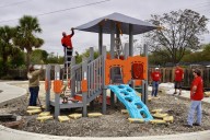 Downtown Rotary Club builds playground at YWCA’s ...