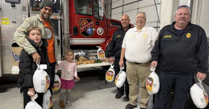 Springfield Township firefighters distribute 400 Thanksgiving meals to families