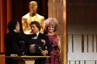 Tom Cruise touts the power of cinema as he accepts honorary Oscar