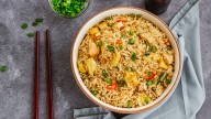 Unlock Fried Rice's Inner Umami Instantly With Just A Few Dashes Of This Liquid