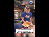 Dodgers' Will Smith works celebratory "shift" at Raising Cane's