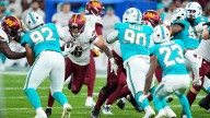Commanders' goal-line stand stops Dolphins, sends game into overtime