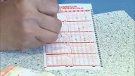 ‘I’m here to play’: Last minute lotto players rush to buy tickets ahead of Mega Millions drawing