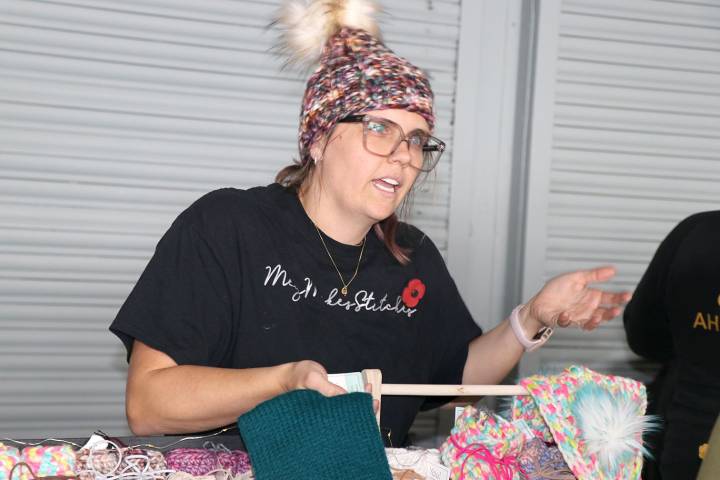 Warming up at holiday craft show at Sault museum