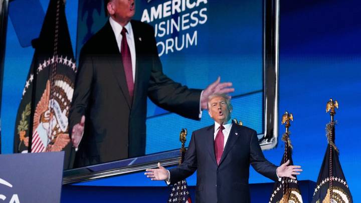 President Donald Trump, in Miami, brags about the economy despite an election