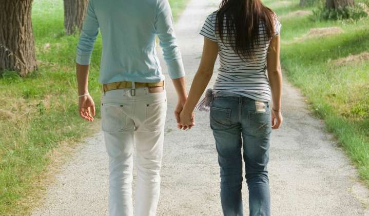 Dear Annie: I have a crush on my friend who is in a relationship. Should I tell him?