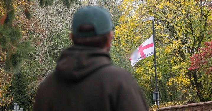 Birmingham flag wars erupt in quiet village as defiant dad faces death threats