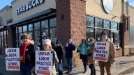 Workers at two Twin Cities Starbucks take part in national strike