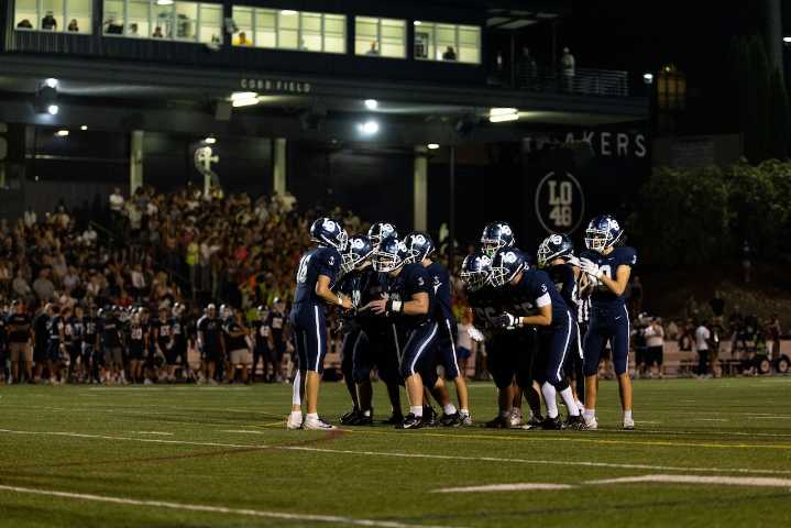 Lake Oswego rolls past Sprague to open football state tournament play