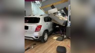 Vehicle slams into T-Mobile store in Bartlett: Photos