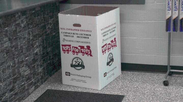 Ebensburg auto shop filling tow truck to help Toys for Tots