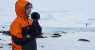 On the world’s coldest stage, a military musician plays with a plastic horn and double gloves