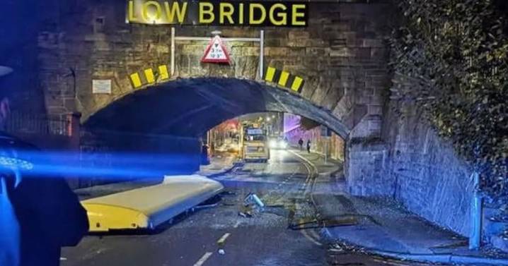 Bus ploughs into low bridge as roof ripped clean off in horror collision