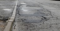 Derby's 'good record' at fixing potholes could stretch into the county, says transport leader