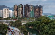 Suben a 75 muertos y 279 desaparecidos en incendio de edificios en Hong Kong