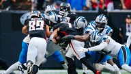 On a day of explosive offense, Panthers' defense stabilized in the second half
