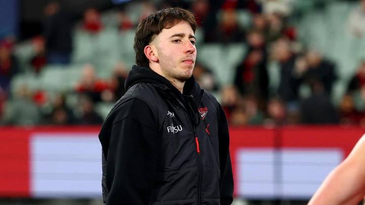 Bombers hold their breath as injured star Nic Martin suffers fresh setback after ACL surgery