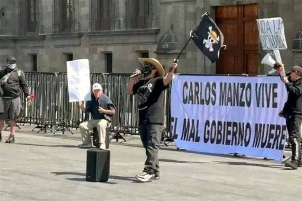 Protestan previo a presentación de Plan Michoacán