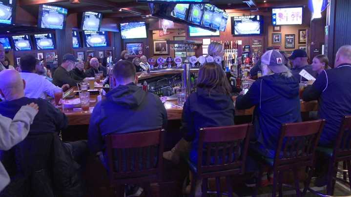 Fans gather in support of the Abington Heights Comets at Tully's in Clark Summit, as the team secured its first