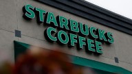 Starbucks workers kick off 65-store US strike on company’s busy Red Cup Day