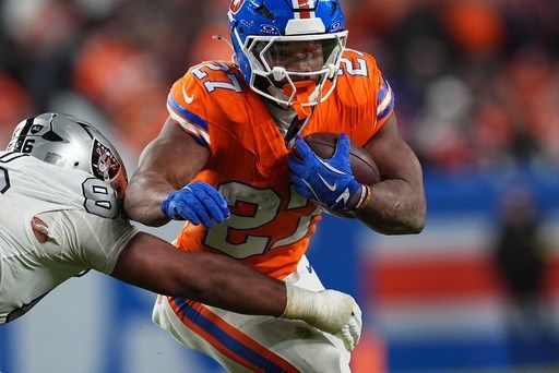 Broncos' J.K. Dobbins needs foot surgery and is likely done for season, AP source says