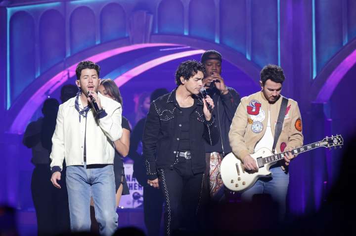 Jonas Brothers bring 20-year celebration tour to fan-filled Rocket Arena (photos)