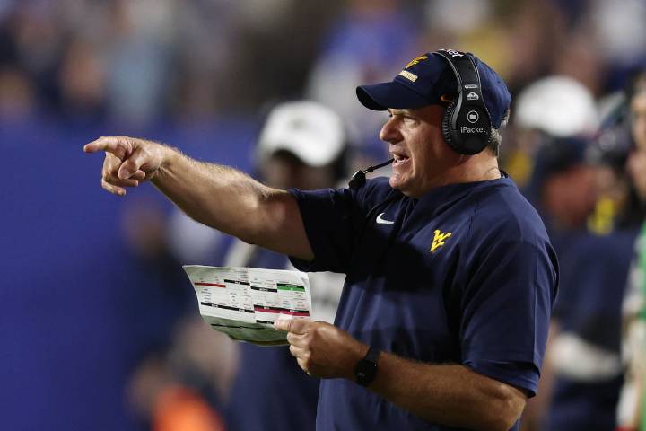 WVU’s Rich Rod Suspects Biased Call From Big 12 Referee as He Makes Major Post-Win Confession West Virginia head coach Rich Rodriguez gets candid on the controversial PI call on the Mountaineers vs Ho