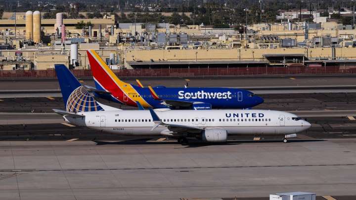 Mile High Beef? Southwest & United Airlines Troll Each Other In New Denver Billboards