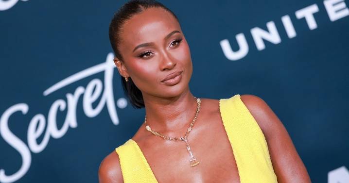 Travis Kelce's Ex & Shaq Posing Deserves Double Take