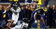 Jordan Marshall runs for 185 yards and 3 TDs to help No. 21 Michigan hold off Purdue for 21