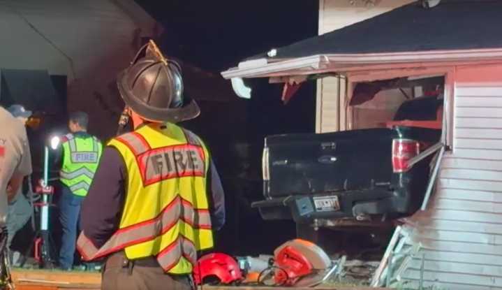 Truck crashes into Greenville home, driver flees: officials