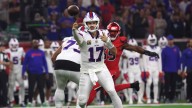Bills QB Josh Allen writhes in pain, kicking ground after huge hit by Texans